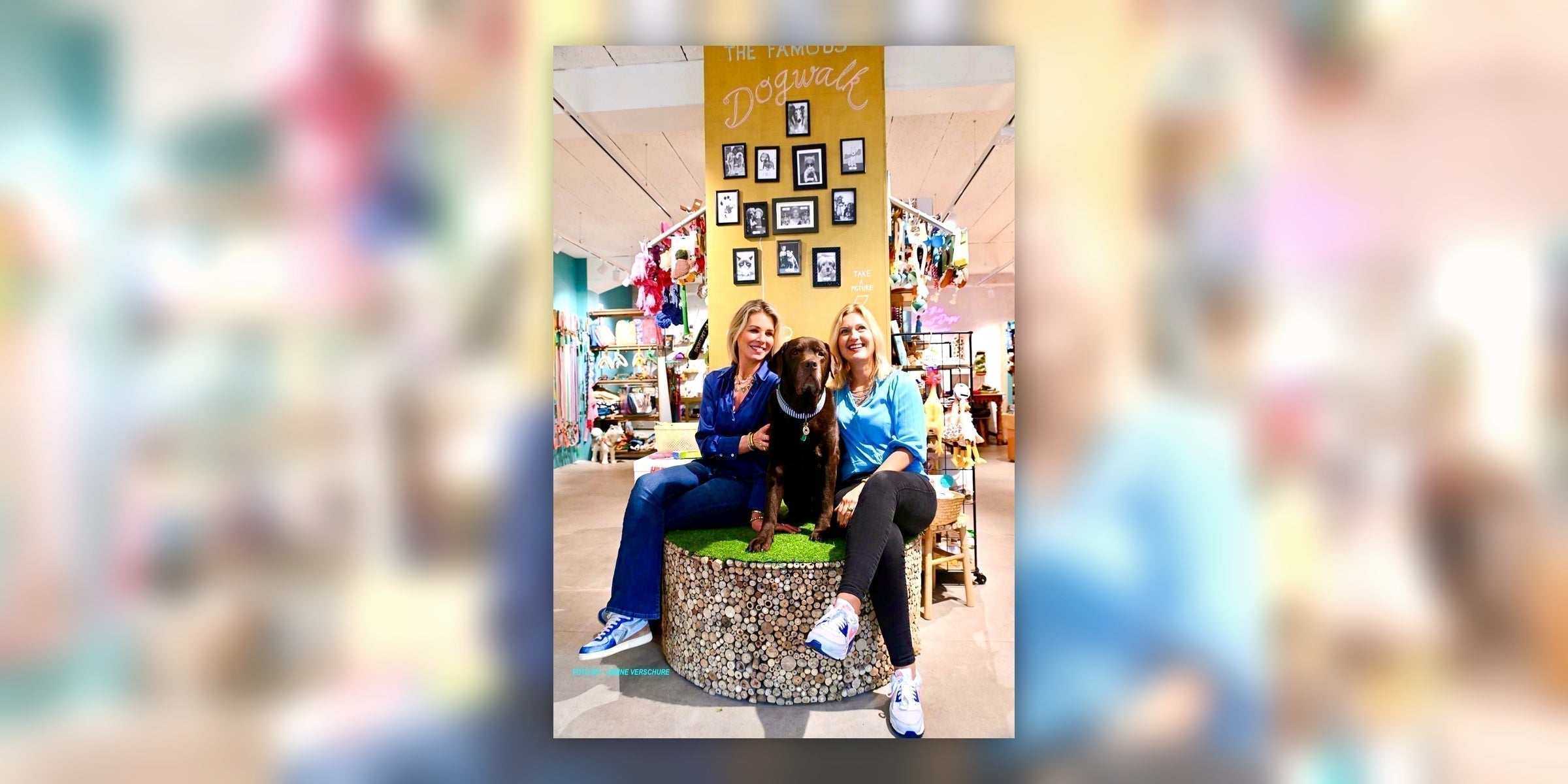 Eugenie Verbiest and Kim Koopman, founders of Dog with a Mission, with their dog in the DWAM flagship store