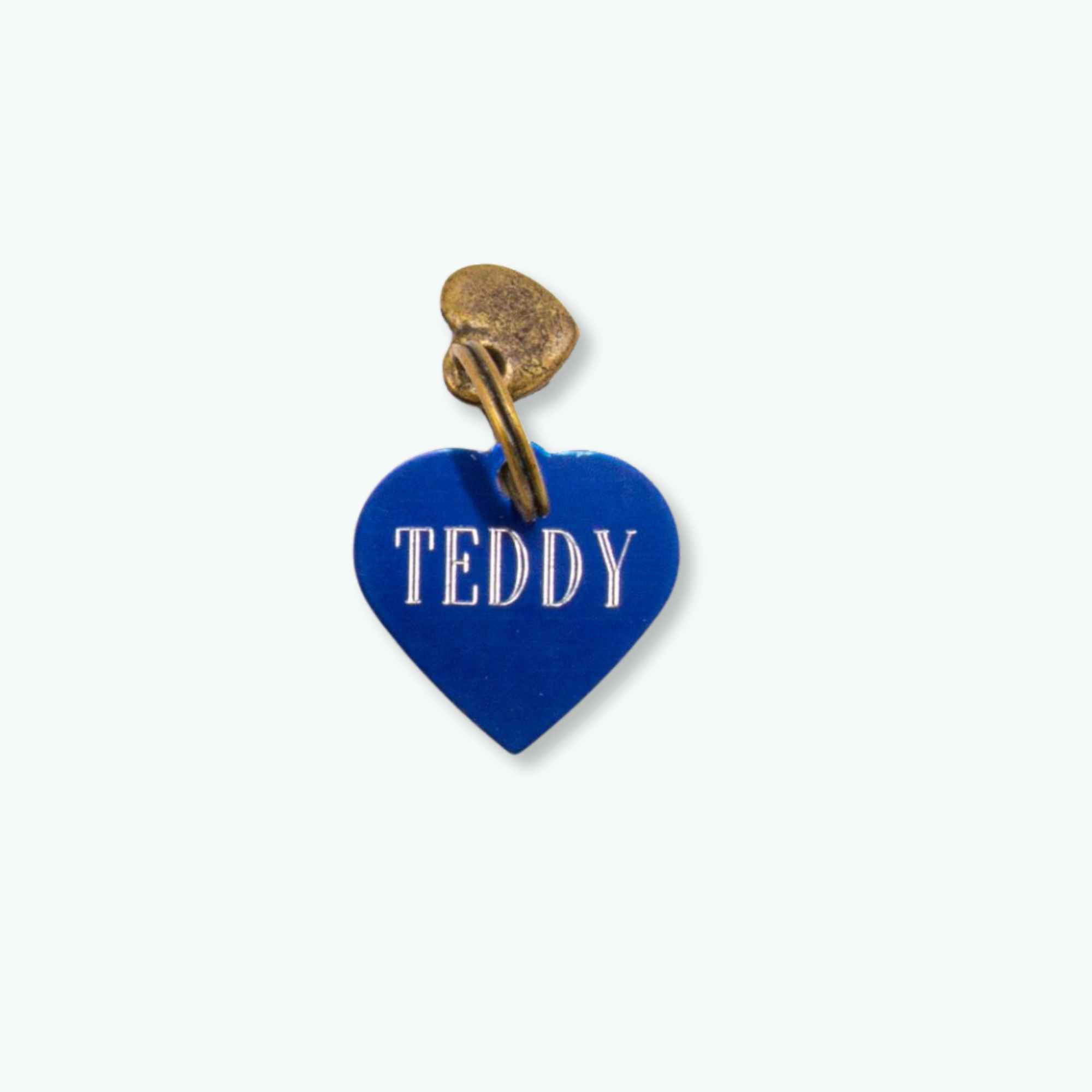 Penning blauw hartje S - Dog with a Mission